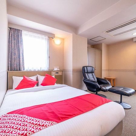 Oyo Business Hotel Nishiura Йоккаити Экстерьер фото