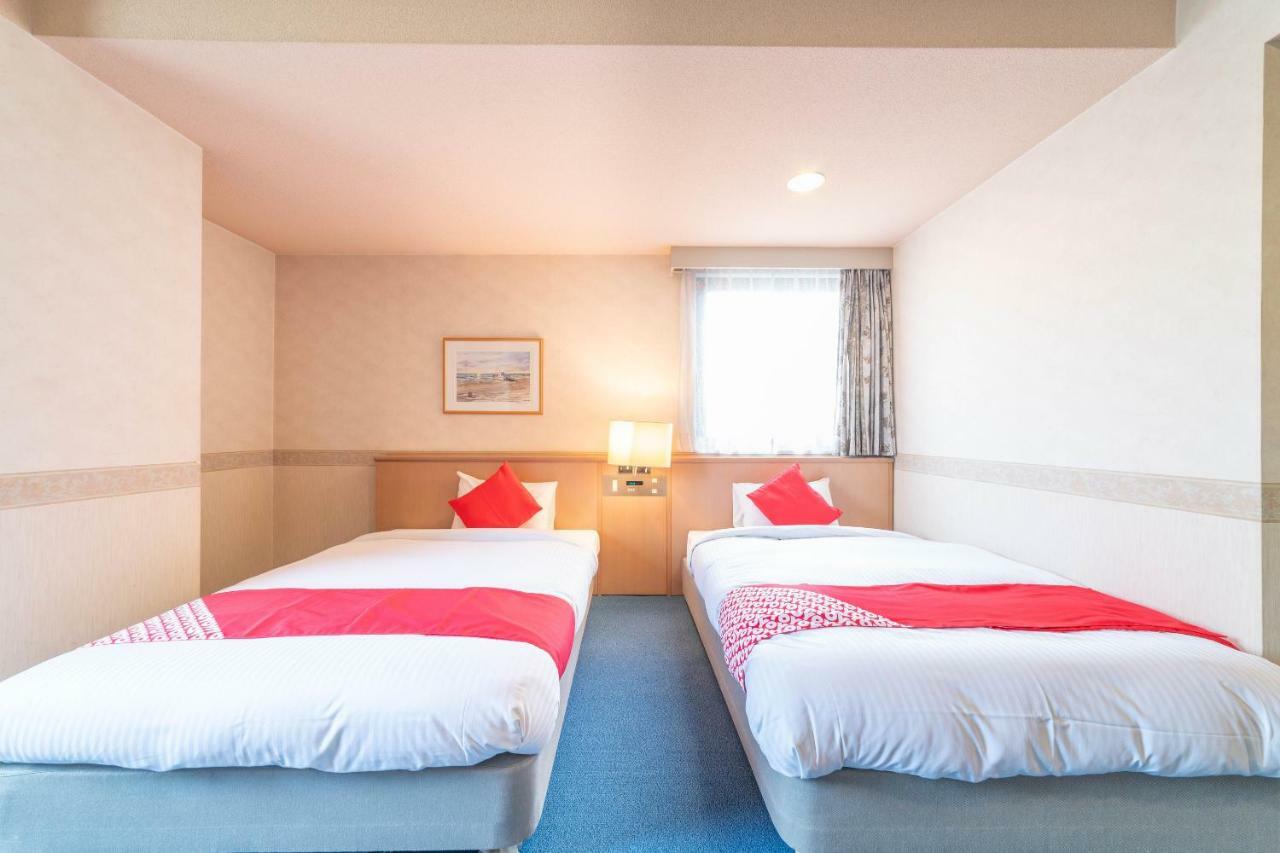Oyo Business Hotel Nishiura Йоккаити Экстерьер фото