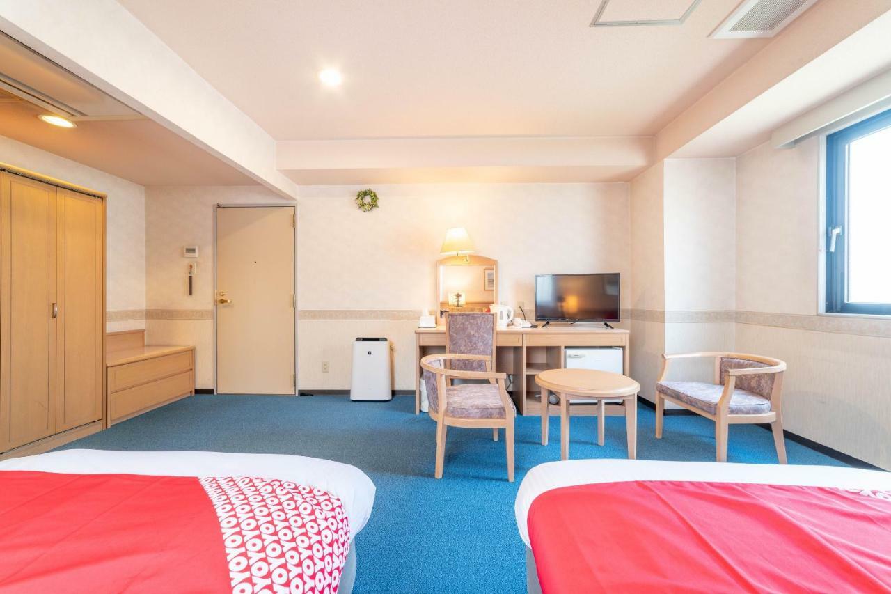 Oyo Business Hotel Nishiura Йоккаити Экстерьер фото