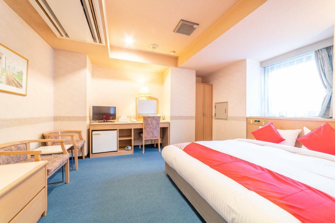 Oyo Business Hotel Nishiura Йоккаити Экстерьер фото