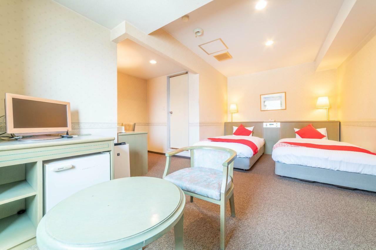 Oyo Business Hotel Nishiura Йоккаити Экстерьер фото