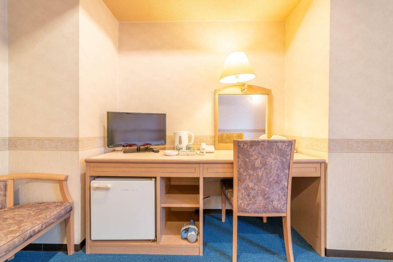 Oyo Business Hotel Nishiura Йоккаити Экстерьер фото